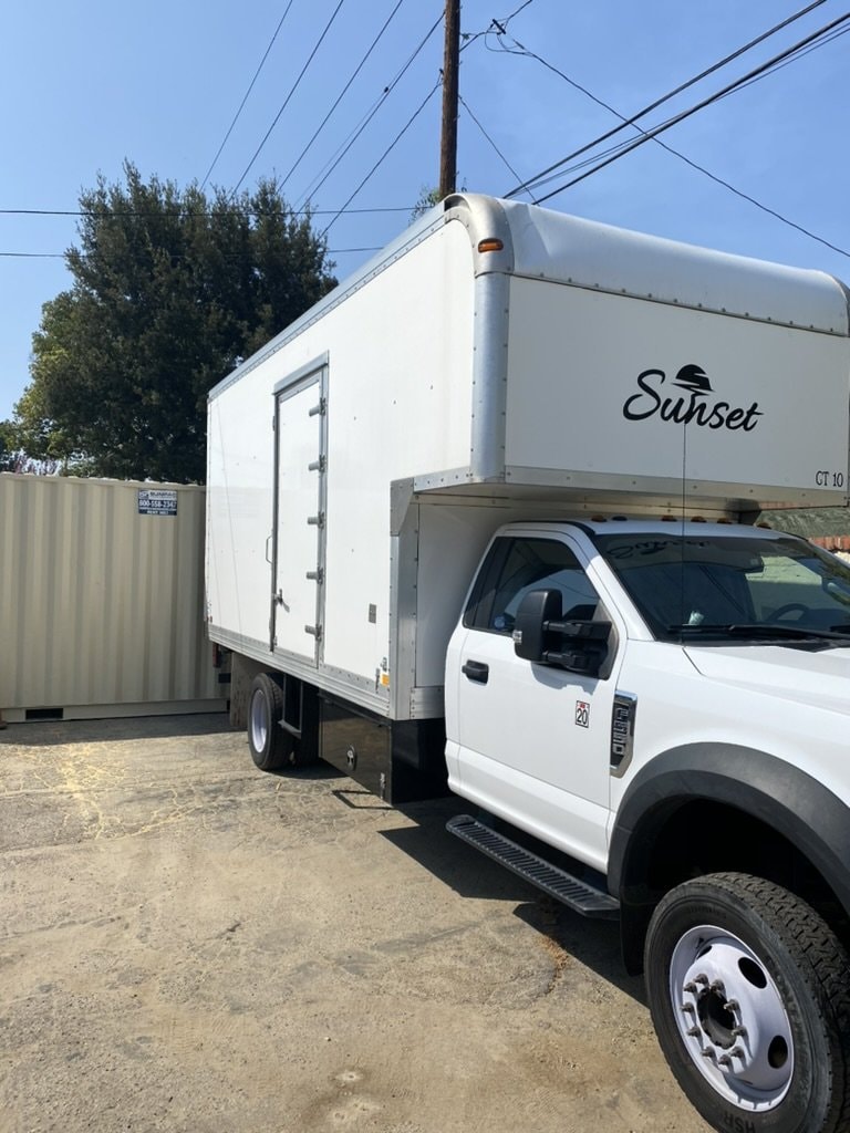 Sunset cube truck side view