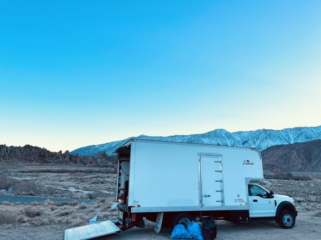 Cube truck with lift gate down in desert